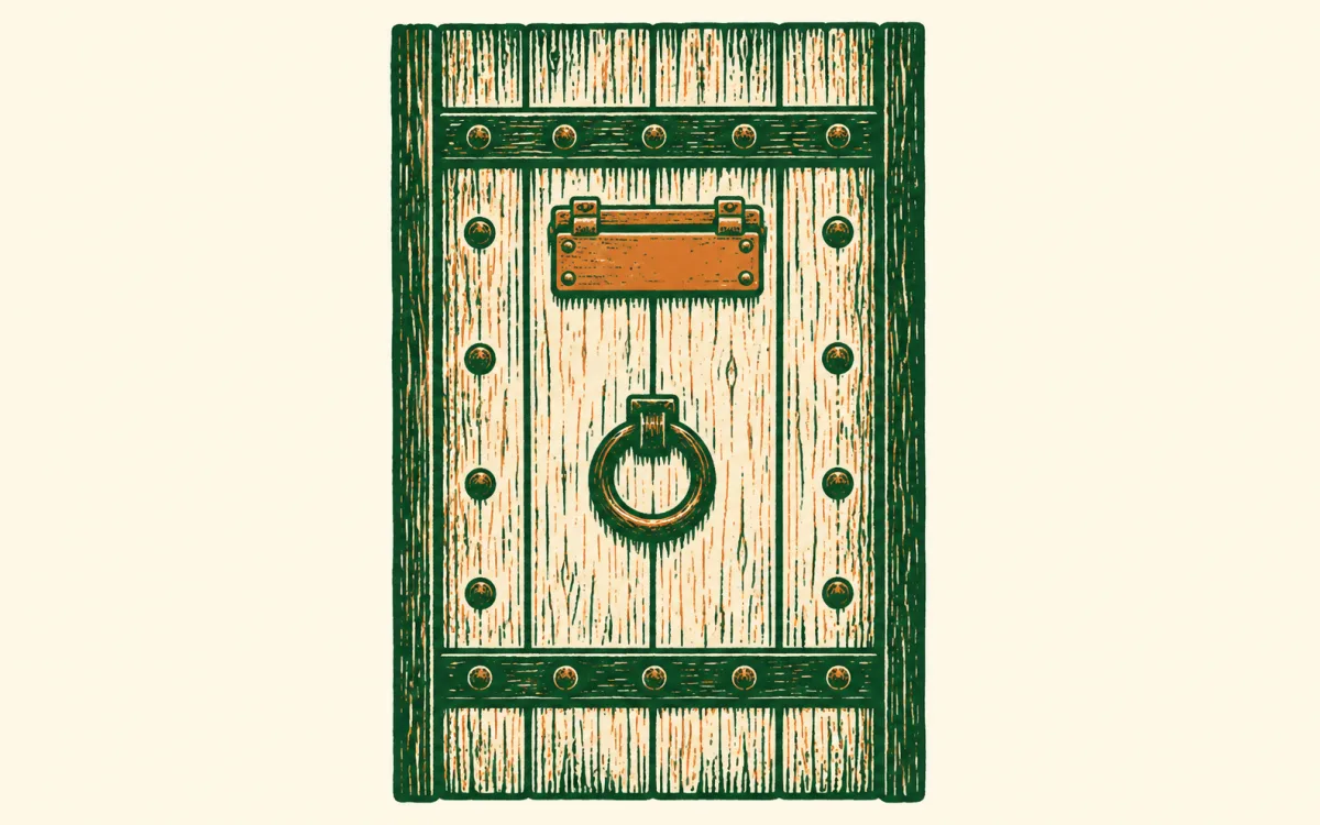 A heavy studded plank door seen straight on and shut, a hinged brass shutter closed at eye height and a plain iron ring handle below it